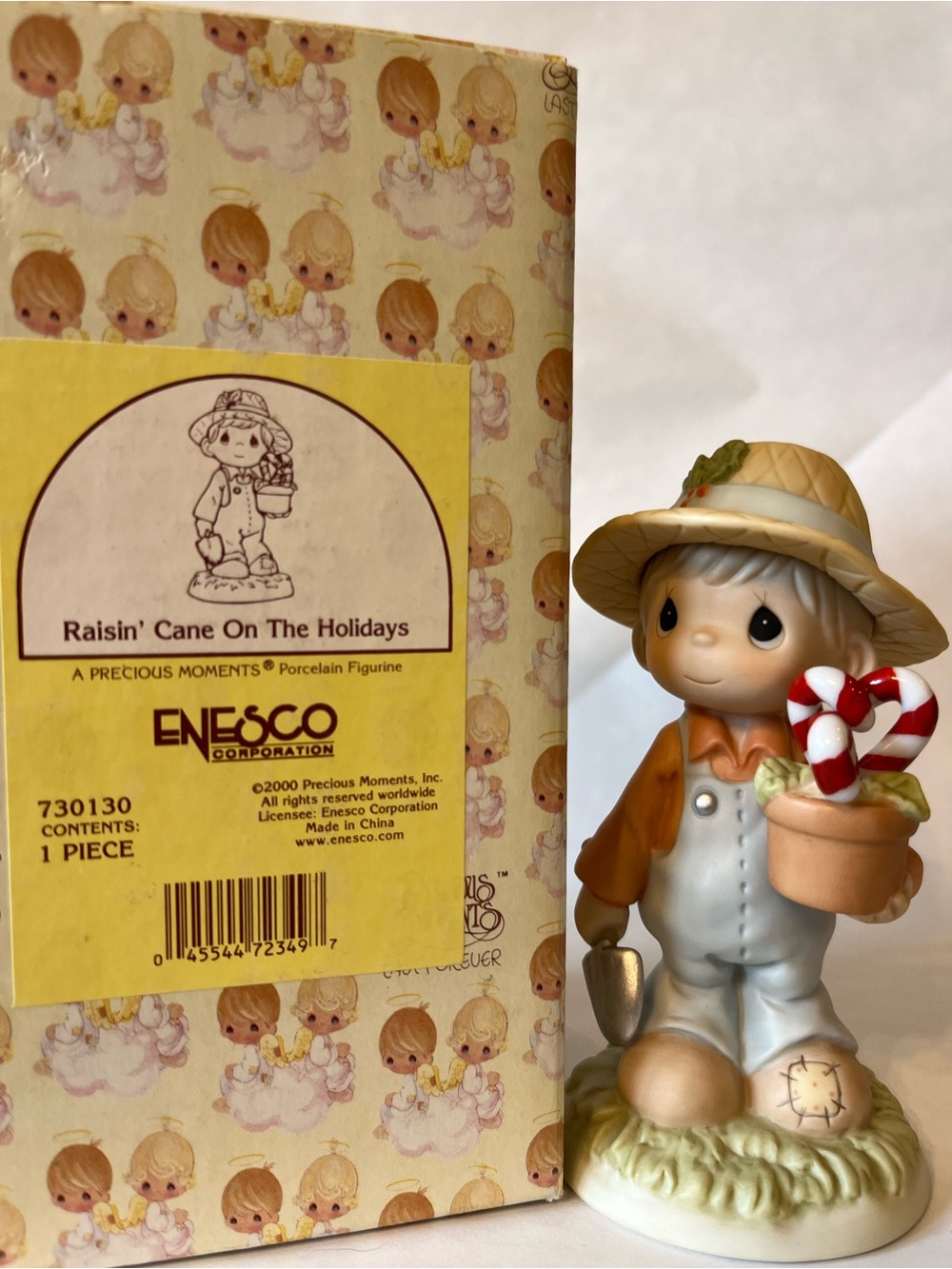 Enesco Precious Moments Boy Figurine with Candy Canes - Cream, Tan & Red